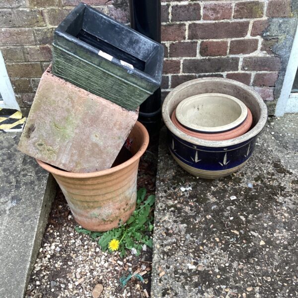 Lot of six vintage garden plant pots and planters.