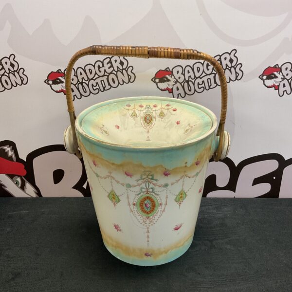 Antique Victorian Crown Devon slop bucket with floral decoration.