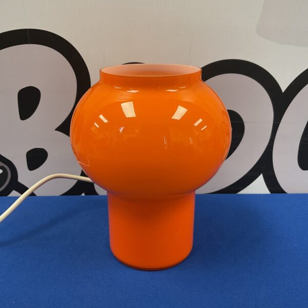 Vibrant 1960s orange glass Habitat table lamp, mid century modern style.