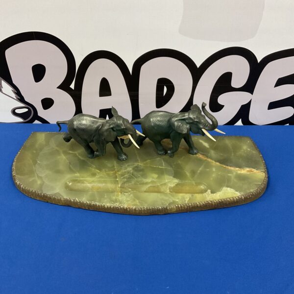 Vintage bronze elephant pen tray on green onyx base.