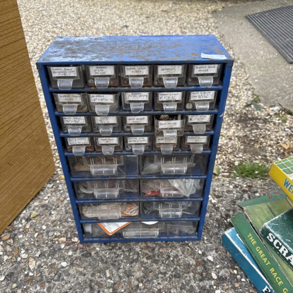 Vintage Mars engineers drawers with labelled compartments for parts storage.