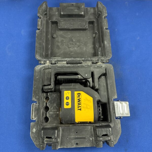 Dewalt DW088 laser level, red beam leveling tool for construction.