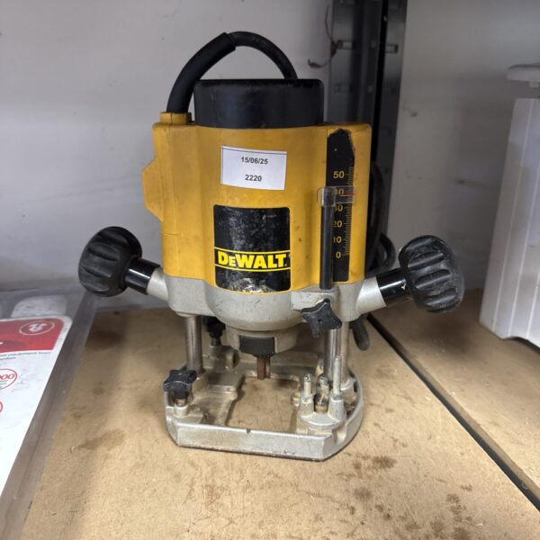 Dewalt DW613 router, a vintage power tool for woodworking projects.