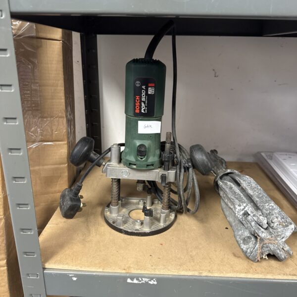 Bosch Pof 500 A router power tool for woodworking projects.