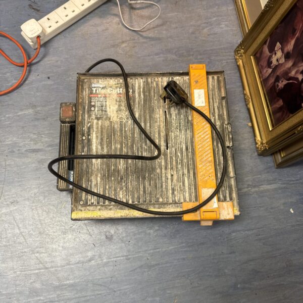 Vintage Plasplugs electric tile cutter for DIY projects.