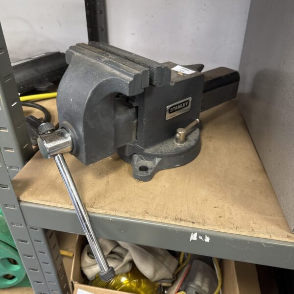 Vintage Stanley bench vice for metalworking and workshop use.