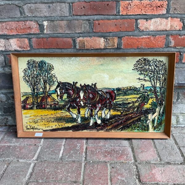 Les Dyke fibreglass artwork of horses ploughing a field.