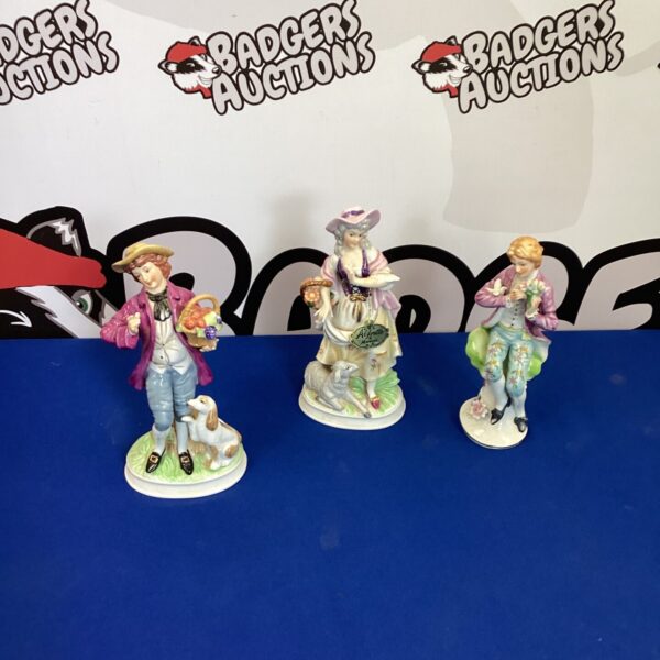 Antique Alfretto porcelain figurines in a lot of three.