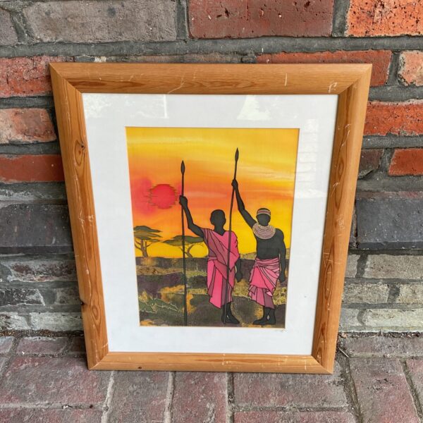 Framed Angela Crozier African silk artwork with sunset scene.