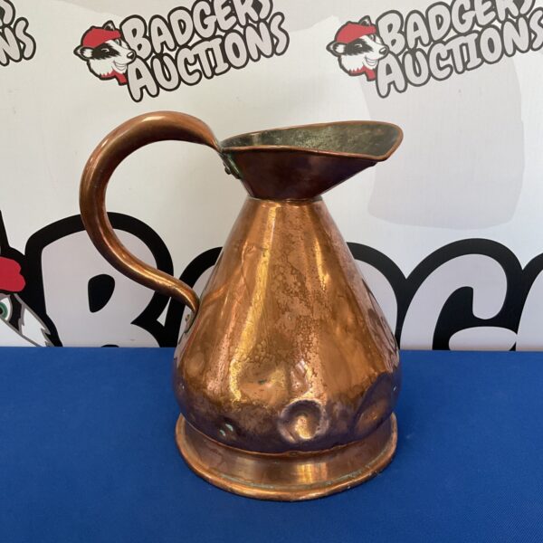 Antique copper haystack pitcher with lead excise mark.