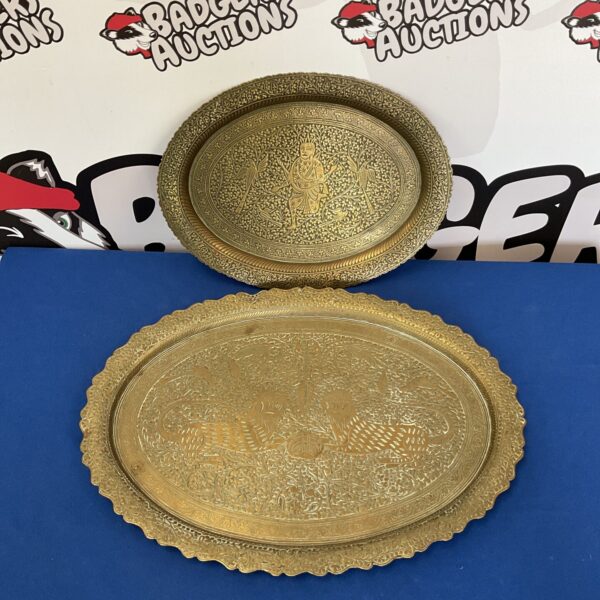Antique Chinese brass tray with intricate lion design.