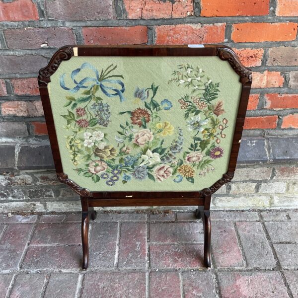 Vintage embroidered firescreen table with floral needlepoint screen.