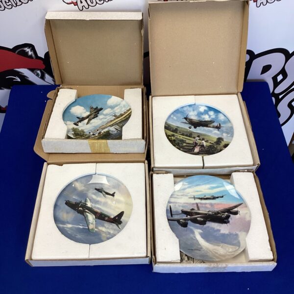 Four Coalport WWII aeroplane collectable plates displayed together.