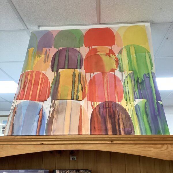 Large modern art canvas print with vibrant abstract colours.