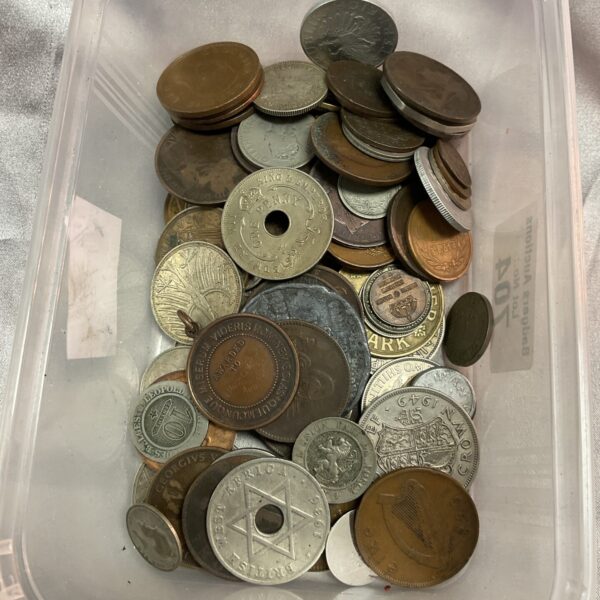 Tray of assorted vintage and collectible coins for collectors.