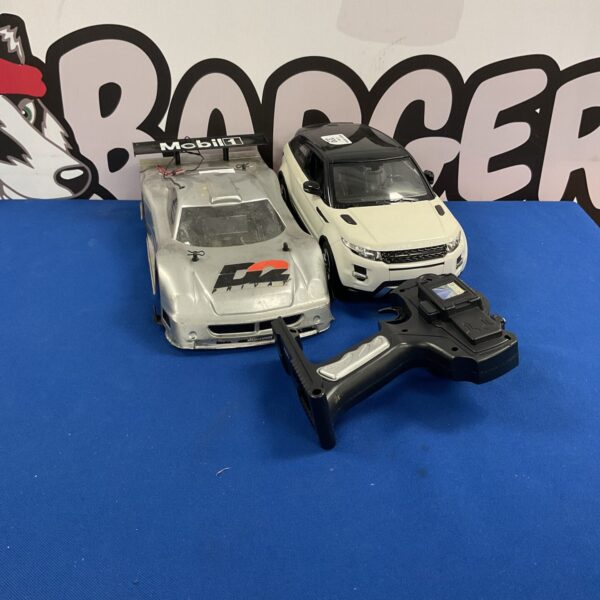 RC cars lot featuring Nikko and Range Rover models.
