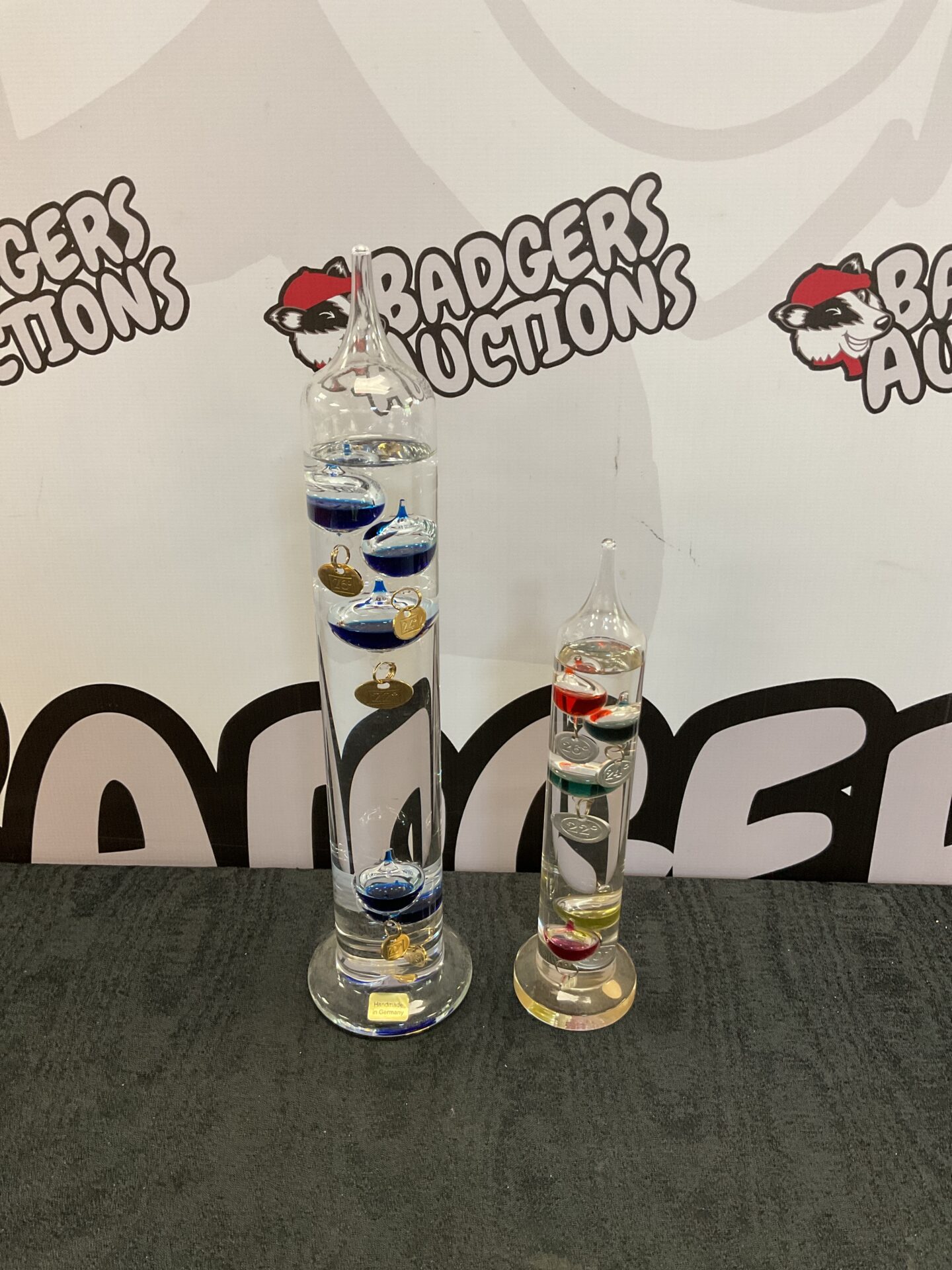 044 Two glass galileo thermometers