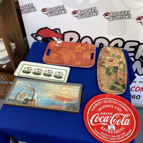 Vintage Coca-Cola trays, a collectible advertising lot.