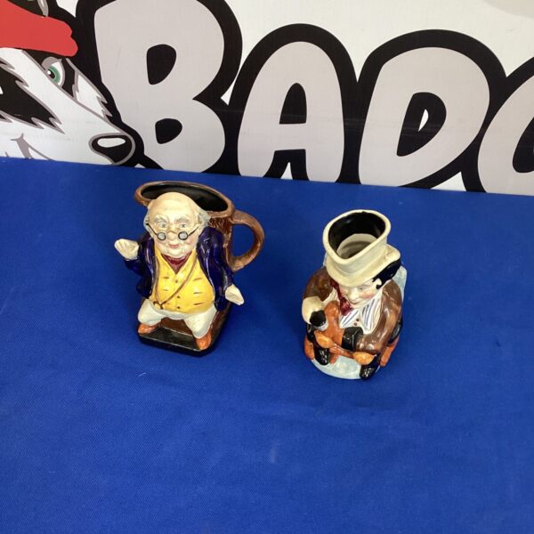 Pair of vintage Ironstone Toby Jugs, collectible character pottery.