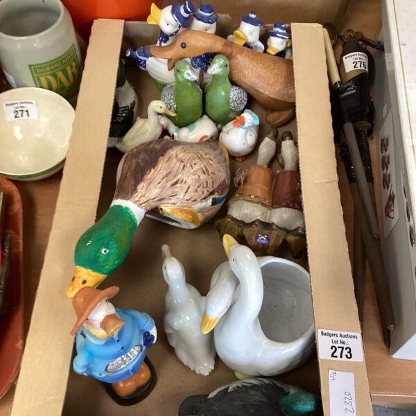 Assorted porcelain duck figurines in a collectible lot.