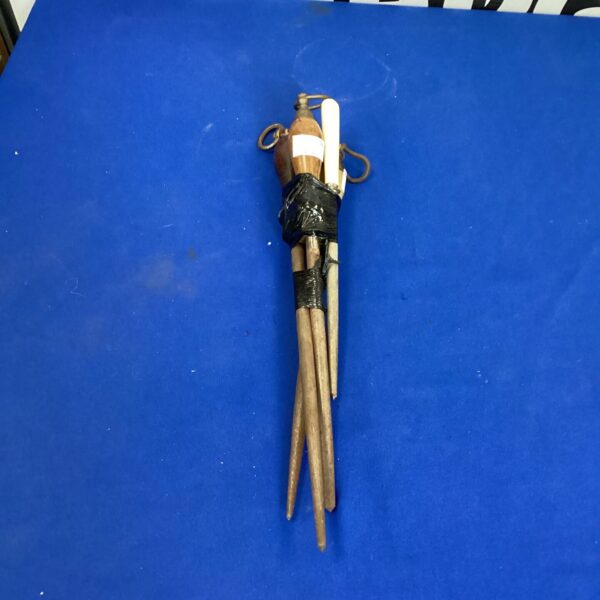 Vintage set of steel knife sharpeners with twine binding.