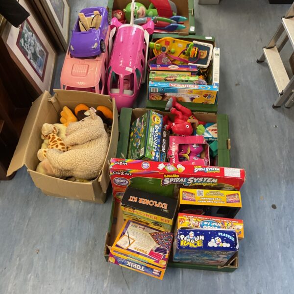 Overview of a large mixed toy joblot with Barbie vehicles and teddy bears.