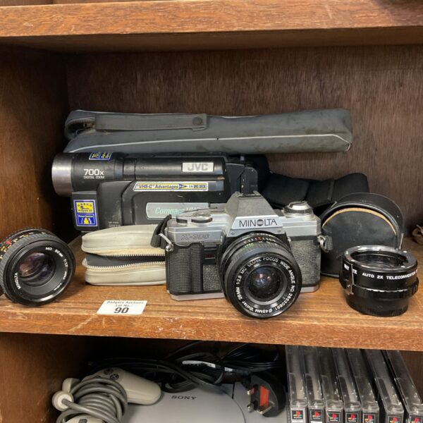 Vintage Minolta X-300 camera kit with JVC camcorder and lenses.