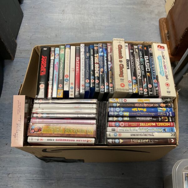 Large lot of DVD box sets and films for home entertainment.
