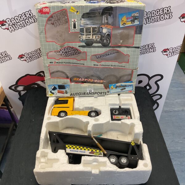 Vintage Dickie autotransport truck with radio control.