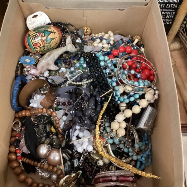 Colourful costume jewellery lot with beaded necklaces and fashion pieces.