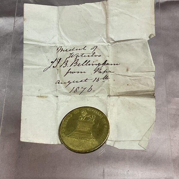 Antique bronze Waterloo medal 1876 with monument depiction.