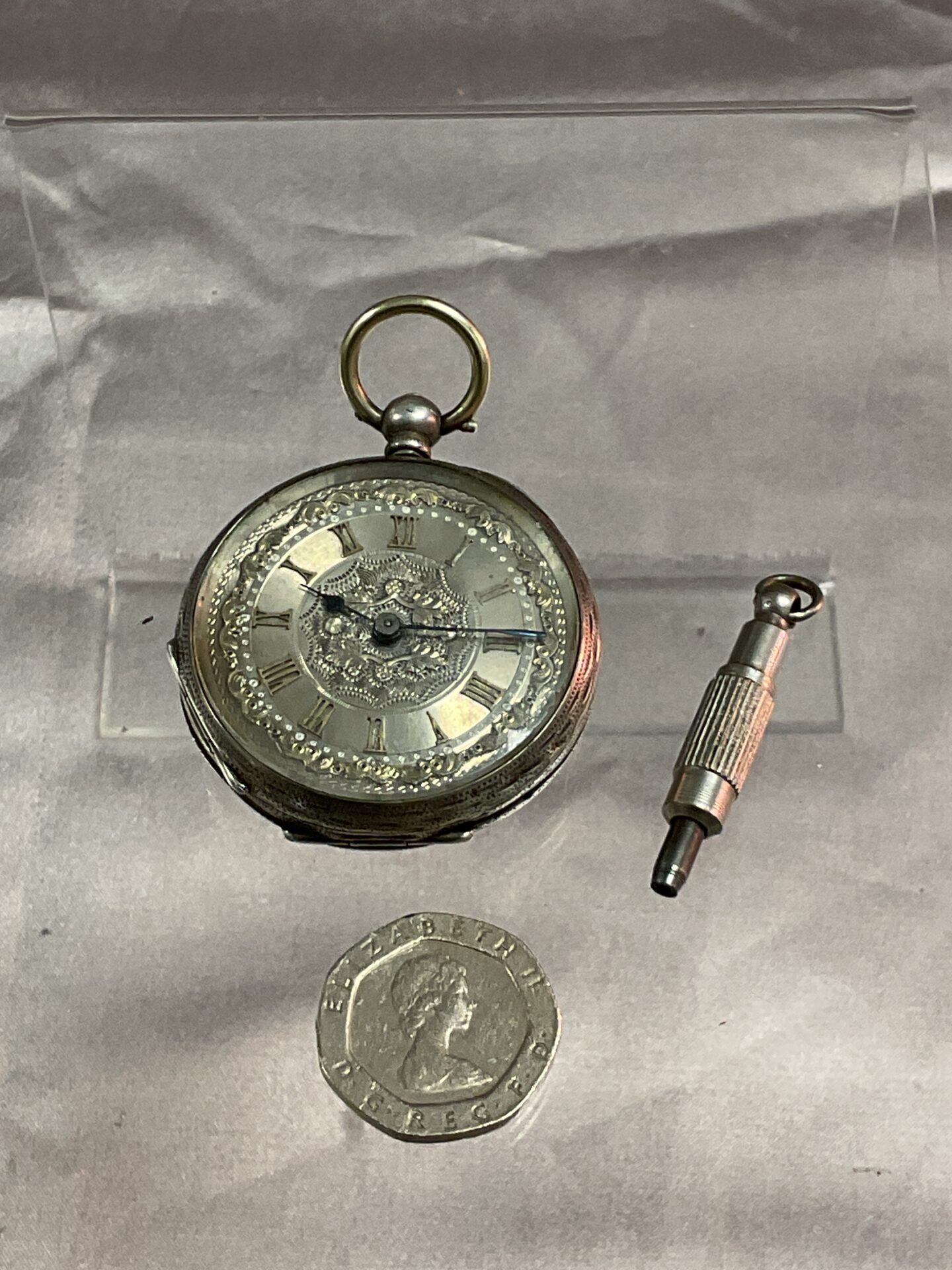 735 800 Silver Ladies pocket watch with key