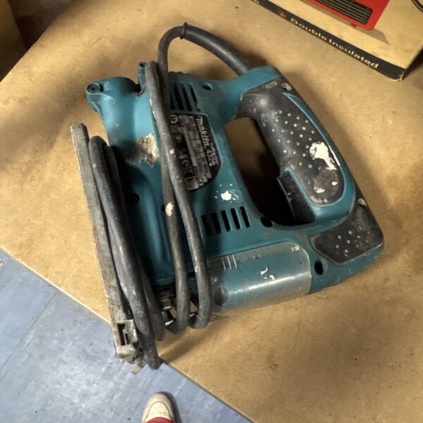 Vintage Makita 4329 jigsaw power tool for woodworking.