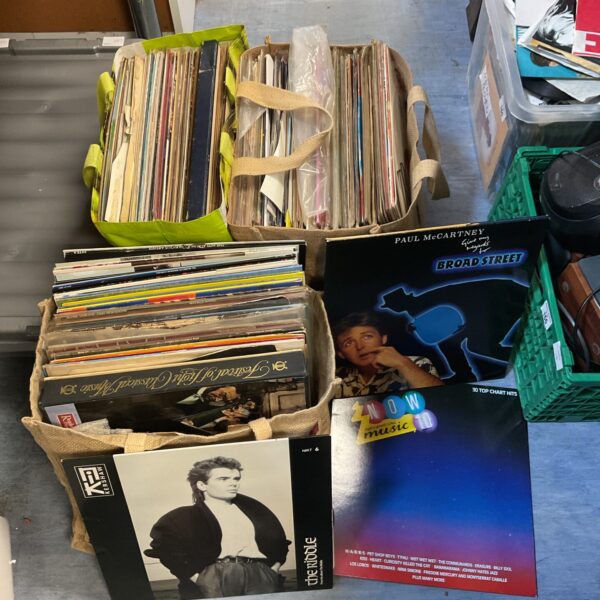 Vinyl records lot including Paul McCartney records for collectors.