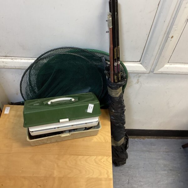 Vintage fishing set with Browning rods and tackle box.