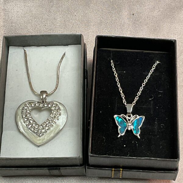 Sparkling crystal heart pendant on silver necklace.