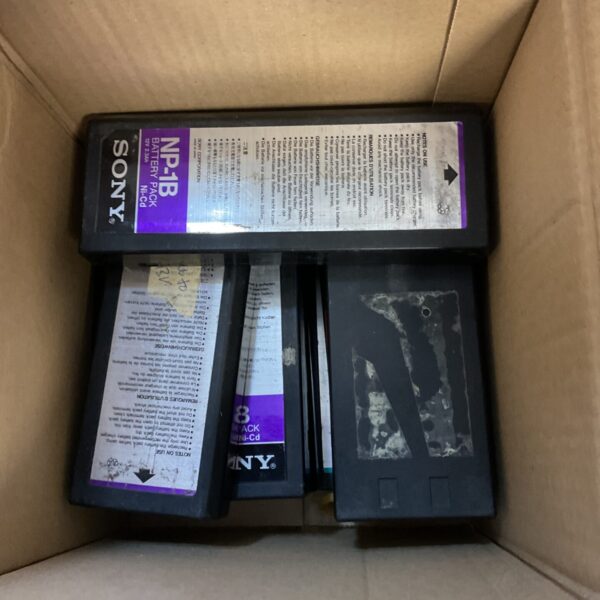 Lot of vintage Sony NP-1B rechargeable batteries for cameras.