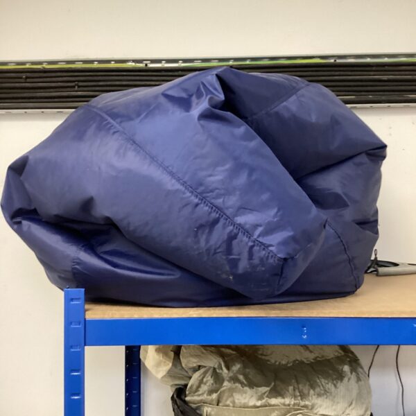 Blue bean bag chair for casual seating and home decor.