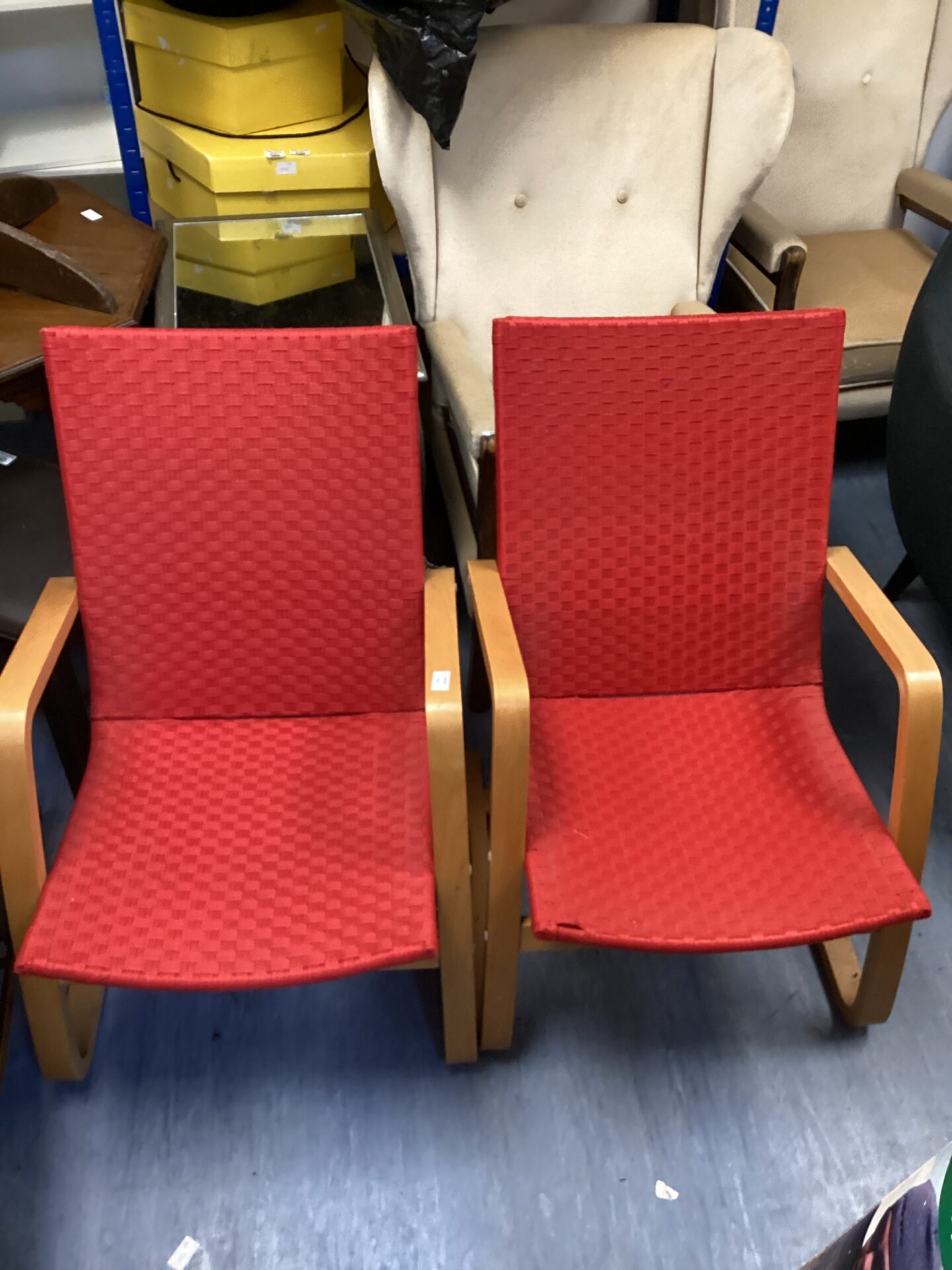 470 Two red living room chairs