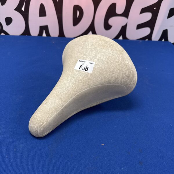 Vintage bicycle saddle, classic retro seat for cycling enthusiasts.