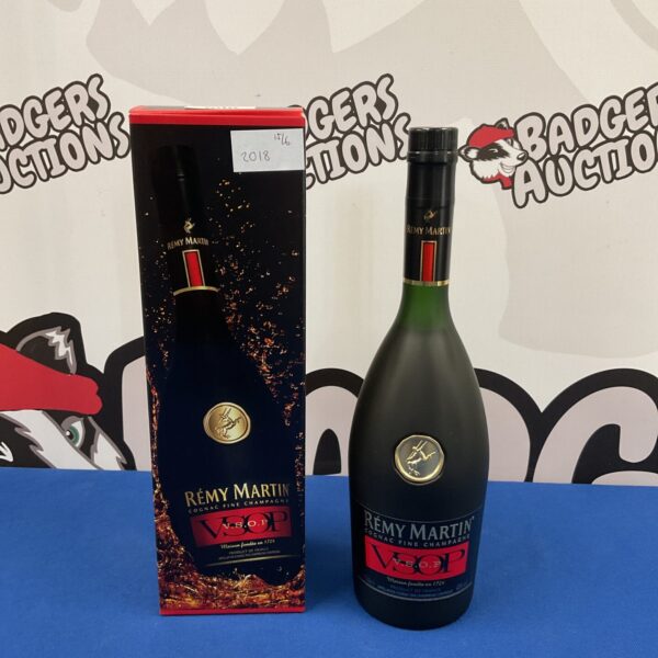 Sealed bottle of Remy Martin V.S.O.P. Cognac Fine Champagne.