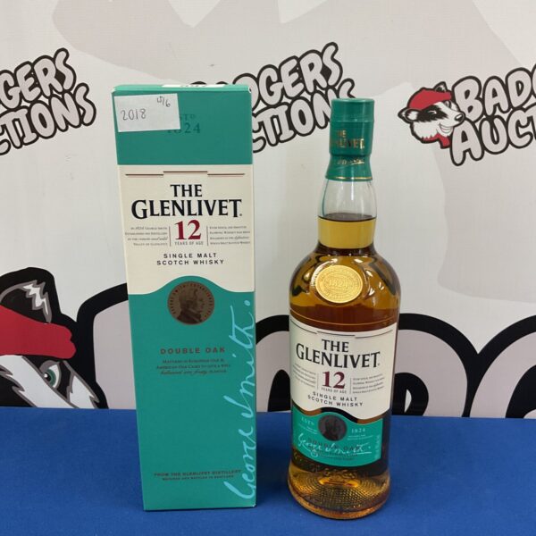 Sealed bottle of Glenlivet 12 year old single malt scotch whisky.