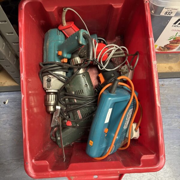 Assorted power tool lot with drill and soldering iron in storage container.