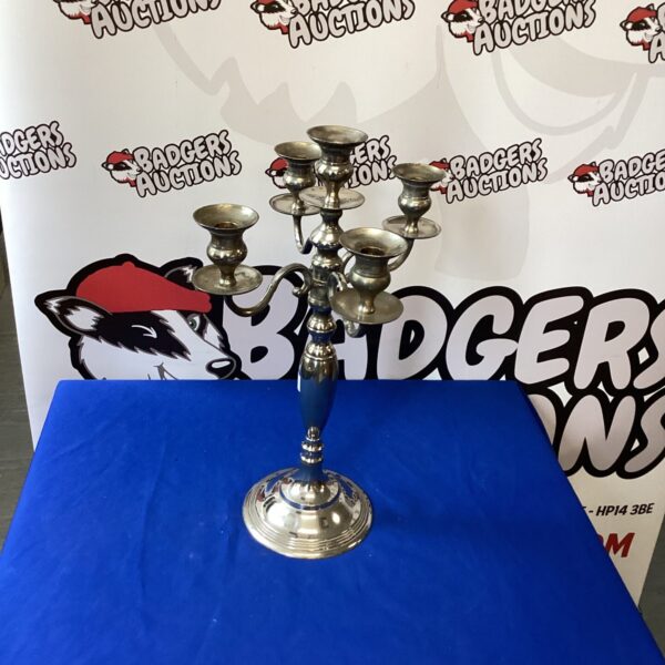 Ornate silverplate candle centrepiece for elegant table displays.