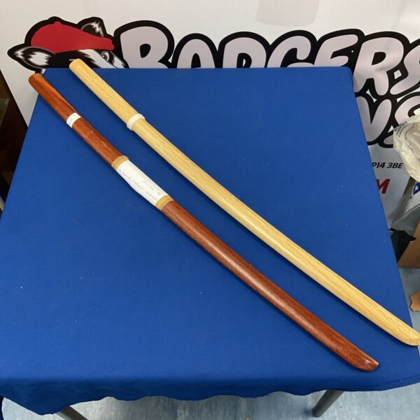 Pair of wooden samurai swords for martial arts practice.