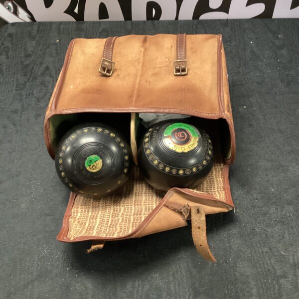 Vintage lawn bowls set from Loudwater Bowls Club in leather case.