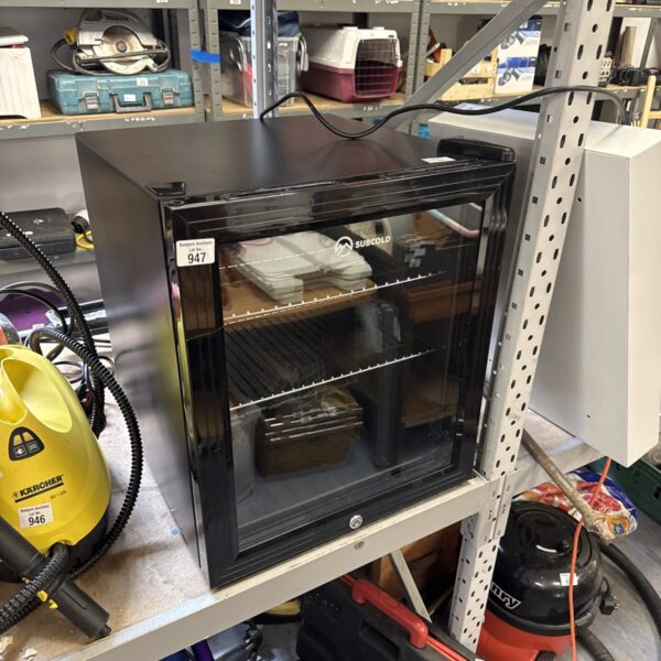 Silver Subcold under counter fridge in a workshop setting.