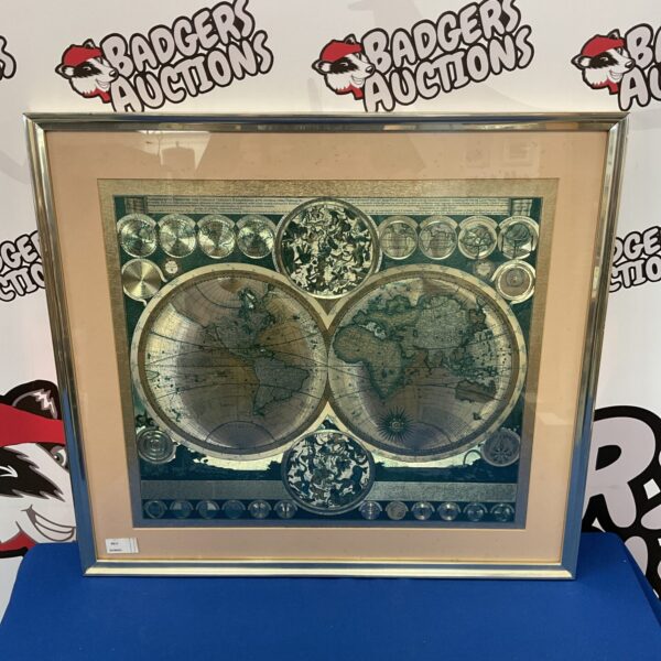 Framed antique world map print with metallic sheen.