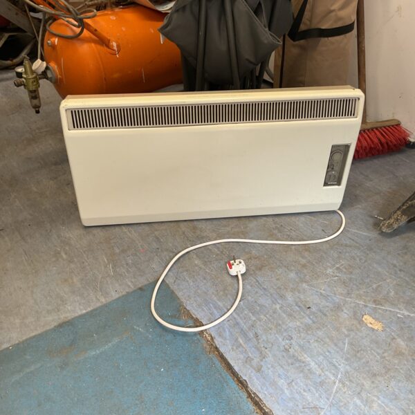 Vintage white Dimplex heater for wall mounting.