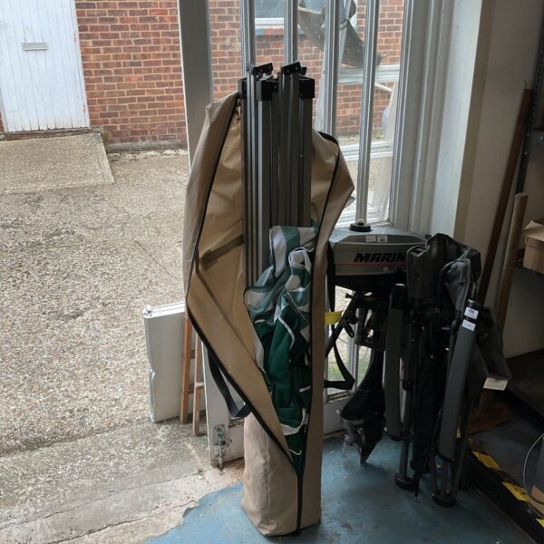Used portable gazebo in carry case, ideal for garden or event shelter.